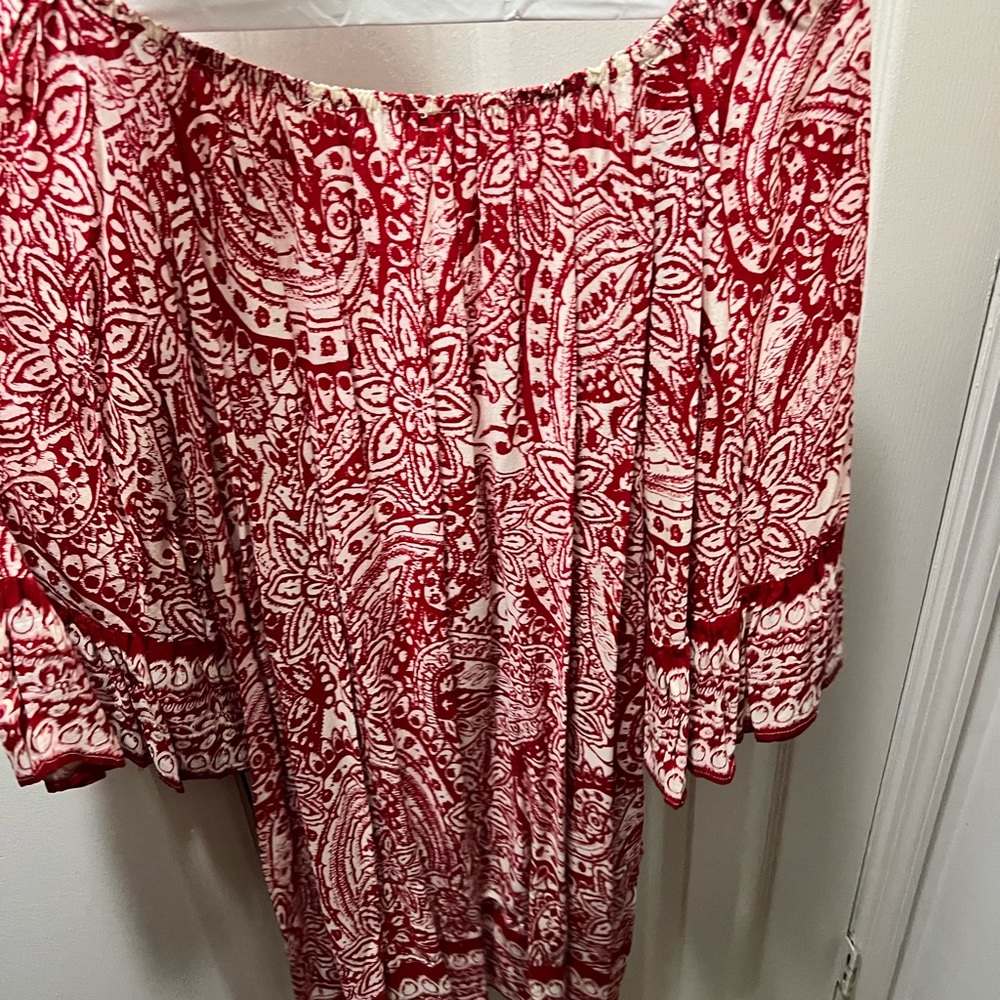 Red and white patterned blouse with pockets